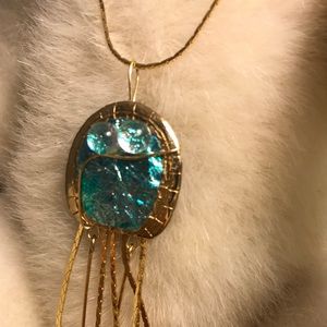 Never worn! Dichroic necklace with gold chain.